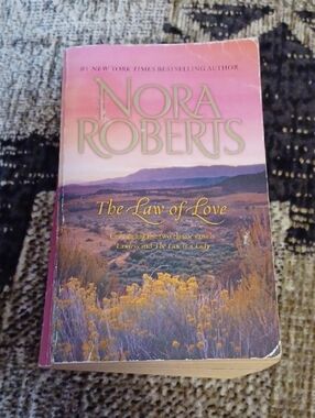 $4 Add-on Nora Roberts "The Law of Love" Paperback Book (2 In 1)